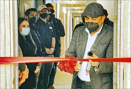 Cinthia Tovar watches as the ribbon is cut opening the new dental clinic in Valle de la Trinidad, Mexico. Cinthia will be the resident dentist at the clinic. Giving back is a strong motivator for Cinthia as she is a former resident of the El Oasis Children’s Village.